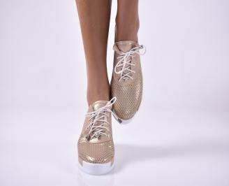 Дамски равни обувки златисти.